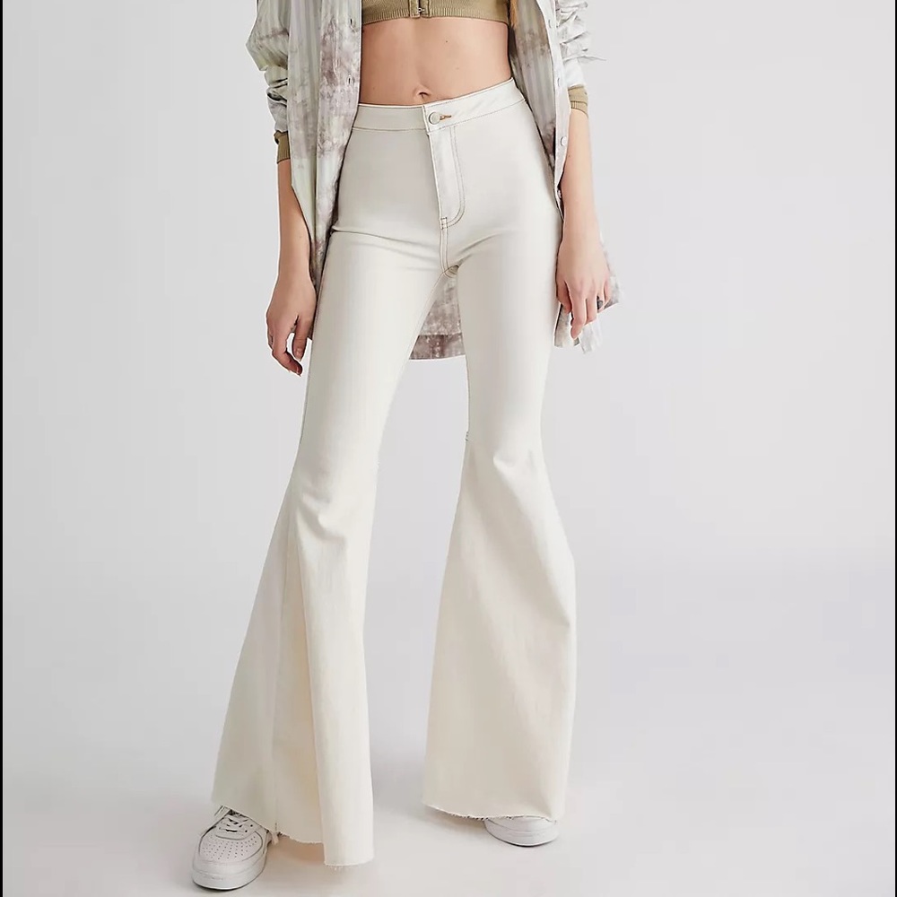 FREE PEOPLE “JUST FLOW ON” FLARE JEANS